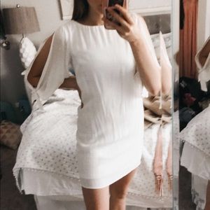 White arm slit with bows dress